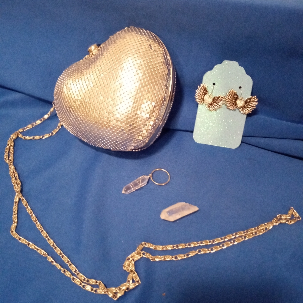Silver heart shaped purse and earrings and crystal